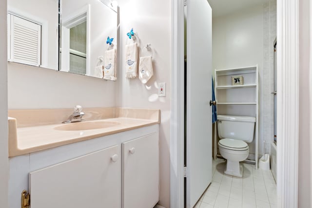 full bathroom featuring vanity, tub / shower combination, tile patterned floors, and toilet