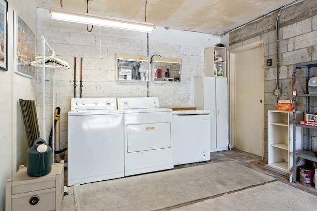 laundry area featuring separate washer and dryer