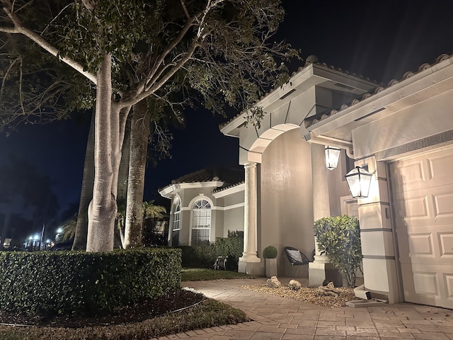 exterior space with a garage