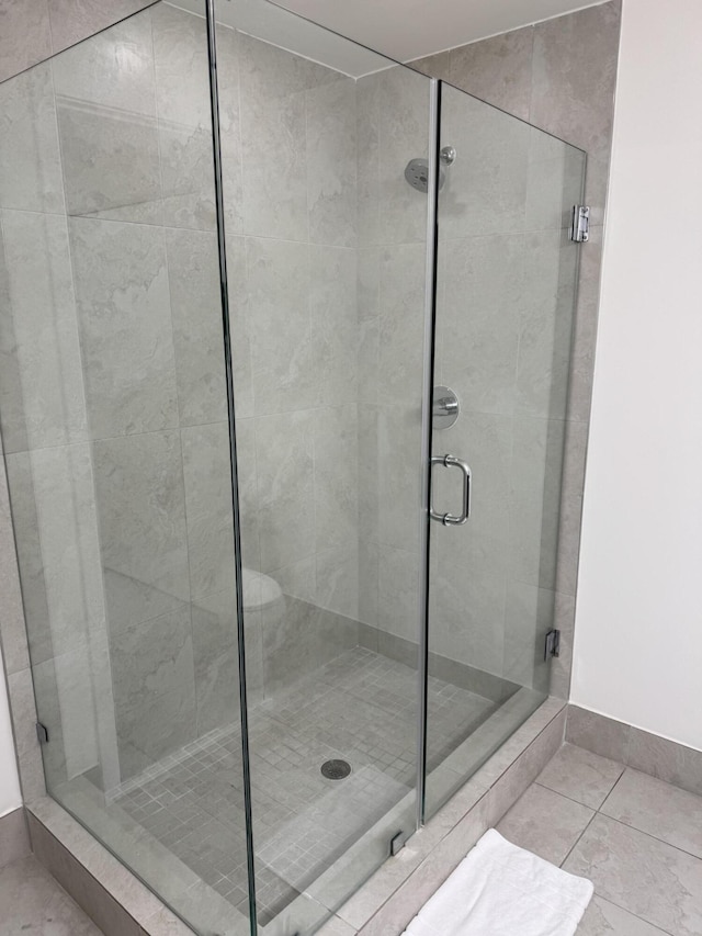 bathroom with an enclosed shower