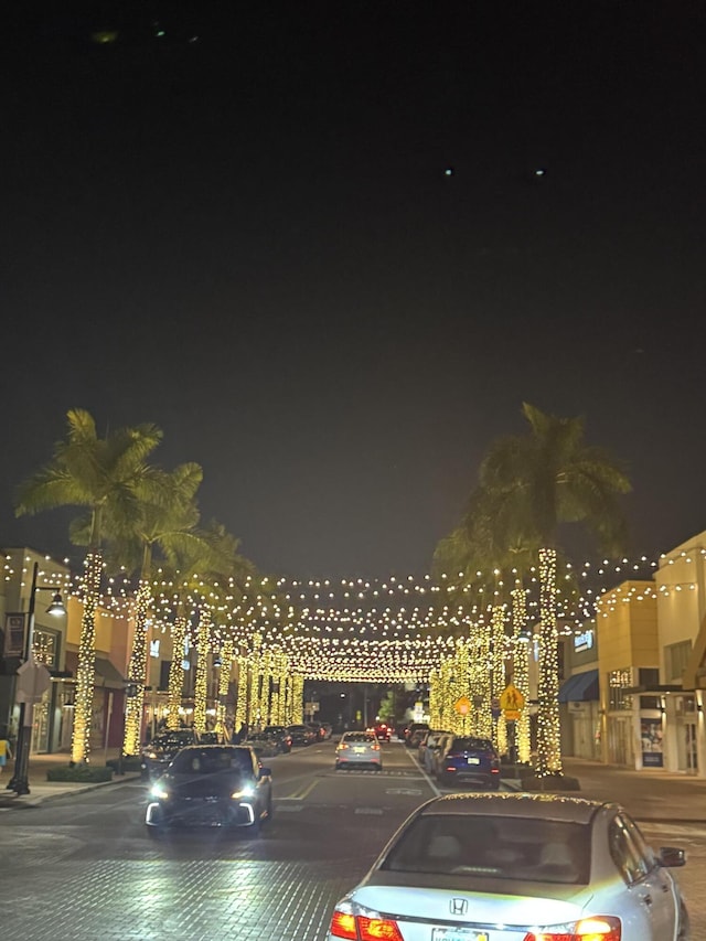 view of parking at night