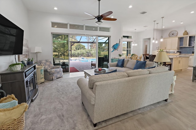 living room with ceiling fan