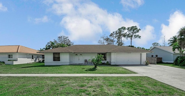 ranch-style house with a garage and a front yard