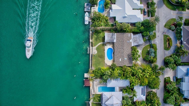 bird's eye view with a water view