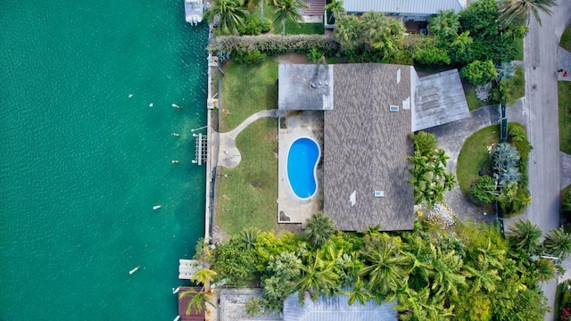 birds eye view of property featuring a water view