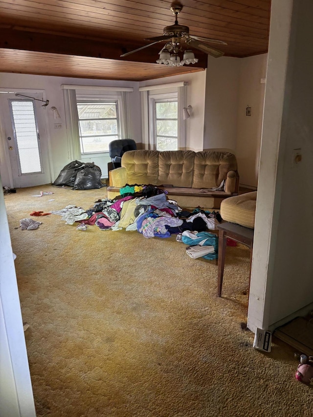 living room featuring wooden ceiling, ceiling fan, and carpet flooring