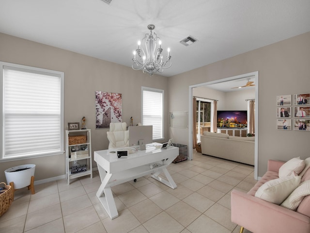 office featuring light tile patterned floors and a chandelier