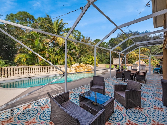 view of patio / terrace featuring a lanai