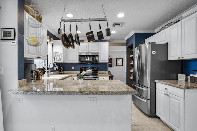 kitchen featuring white cabinetry, sink, kitchen peninsula, stainless steel appliances, and light stone countertops