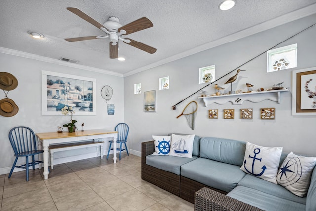 living room with light tile patterned floors, crown molding, a textured ceiling, and ceiling fan