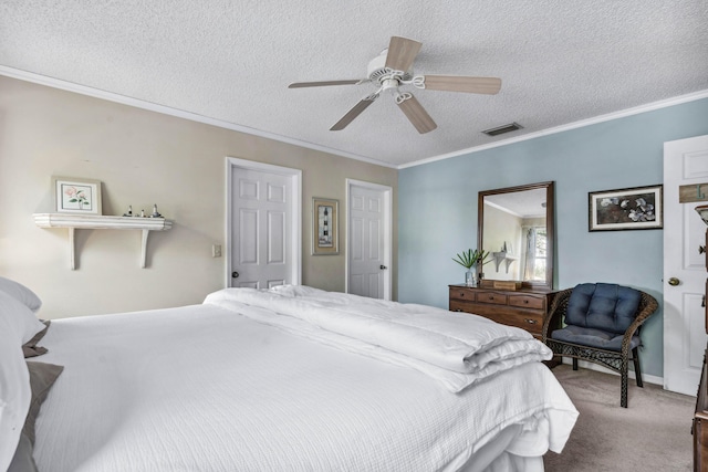 carpeted bedroom featuring ceiling fan, crown molding, and a textured ceiling