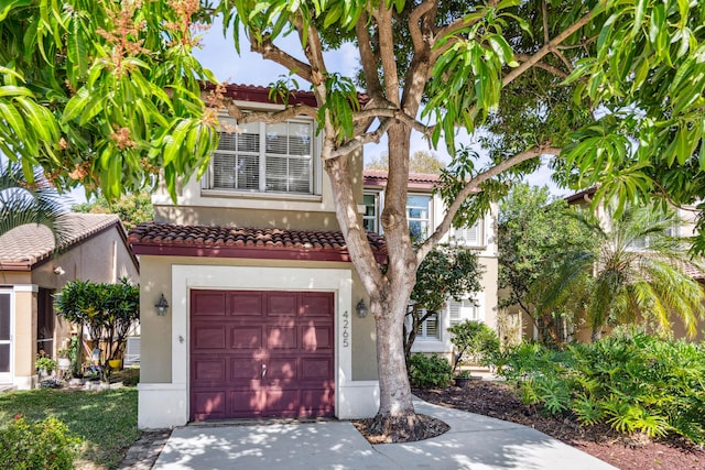 view of front of property with a garage