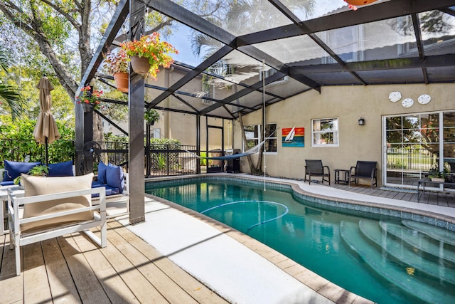 view of pool featuring a lanai