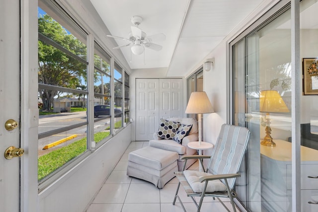 sunroom featuring a wealth of natural light and ceiling fan