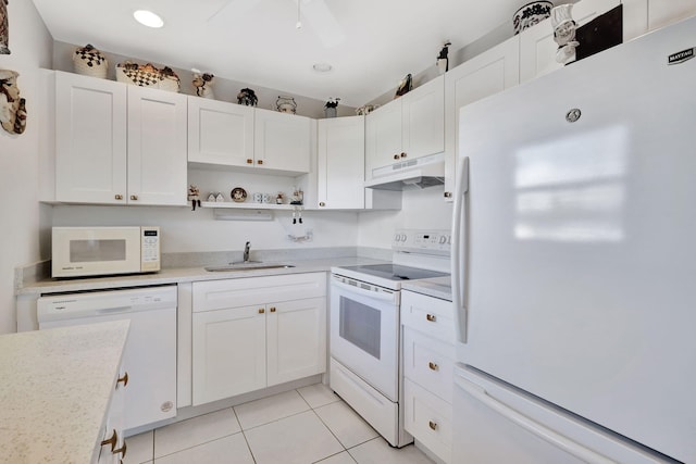 kitchen with white cabinetry, white appliances, sink, and light tile patterned floors