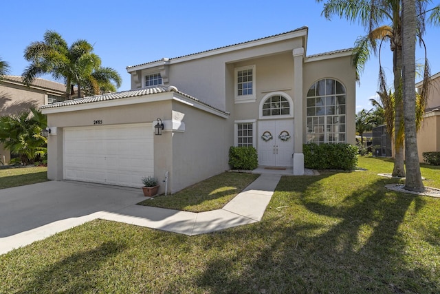 mediterranean / spanish-style house featuring a front yard