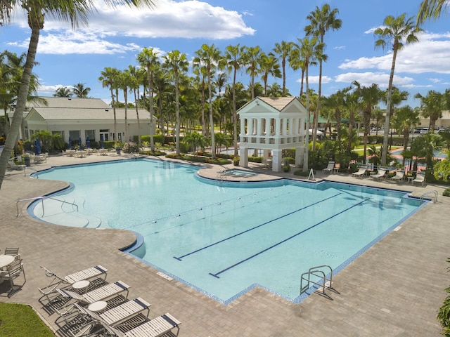 view of swimming pool with a patio