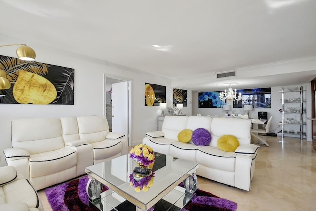 living room with an inviting chandelier