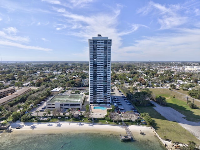 drone / aerial view with a view of the beach and a water view