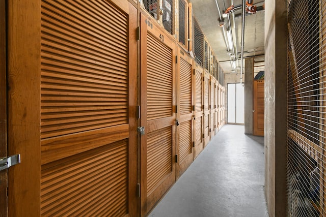 corridor with concrete floors