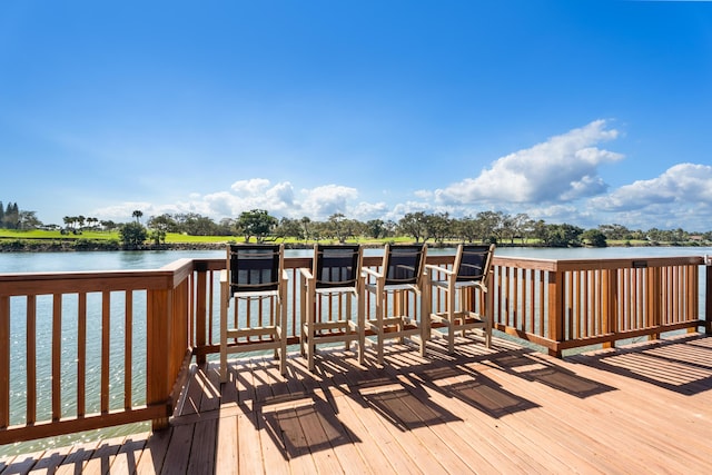 deck featuring a water view