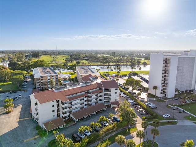 drone / aerial view with a water view