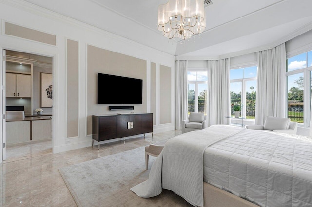 bedroom featuring an inviting chandelier