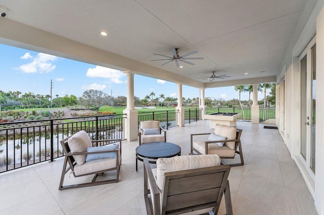 view of patio featuring an outdoor hangout area and ceiling fan