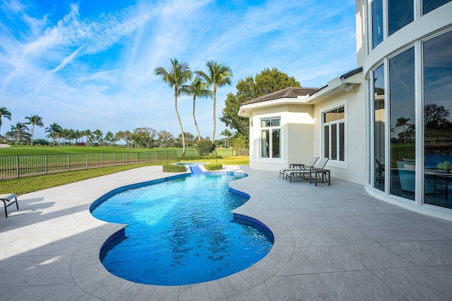 view of pool featuring a patio area