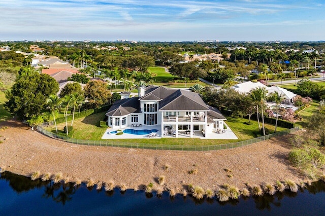 drone / aerial view with a water view