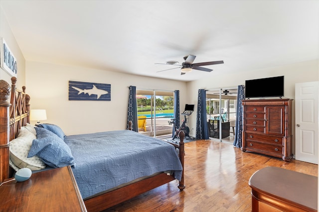 bedroom with a ceiling fan, access to outside, and wood finished floors