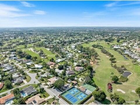 drone / aerial view with view of golf course