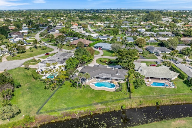 aerial view with a residential view and a water view