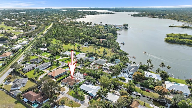 birds eye view of property featuring a residential view and a water view