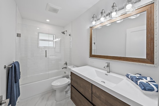 bathroom with toilet, visible vents, marble finish floor, vanity, and enclosed tub / shower combo