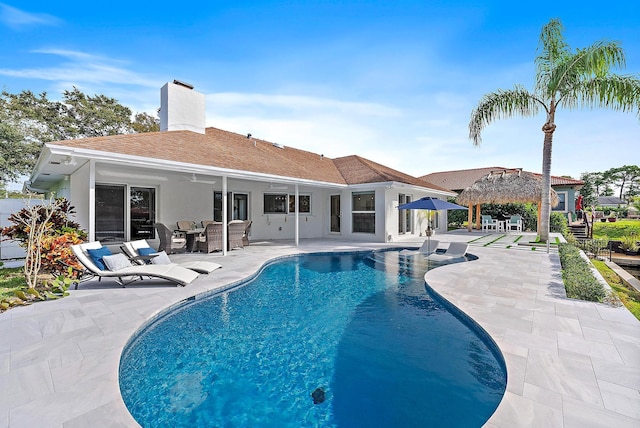 view of swimming pool featuring a gazebo, an outdoor hangout area, and a patio area