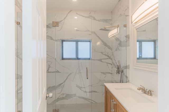 bathroom featuring vanity and walk in shower