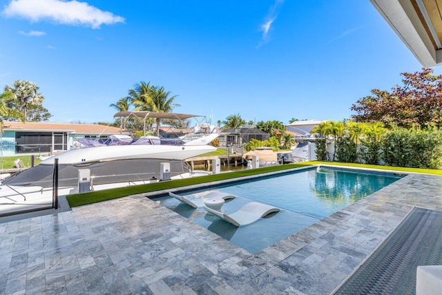 outdoor pool featuring a patio