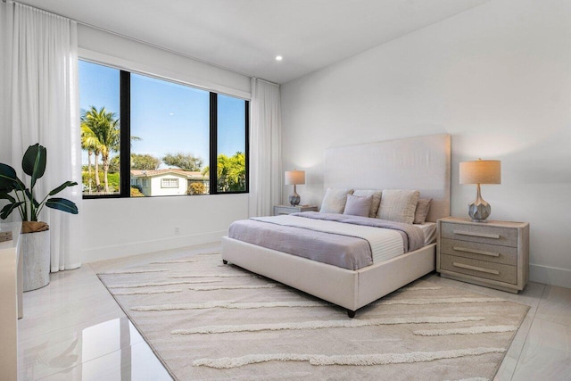 bedroom featuring recessed lighting and baseboards