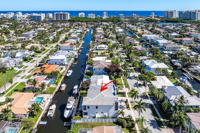 bird's eye view with a water view