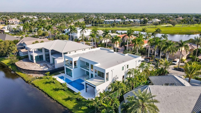 aerial view with a residential view and a water view