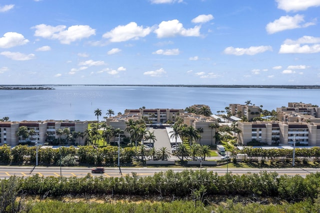 birds eye view of property featuring a water view