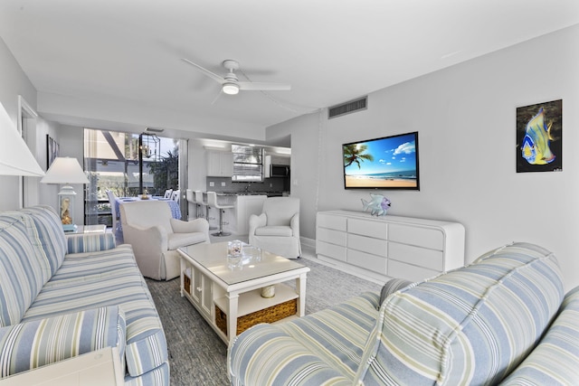 living room featuring ceiling fan