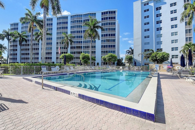 view of swimming pool with a patio