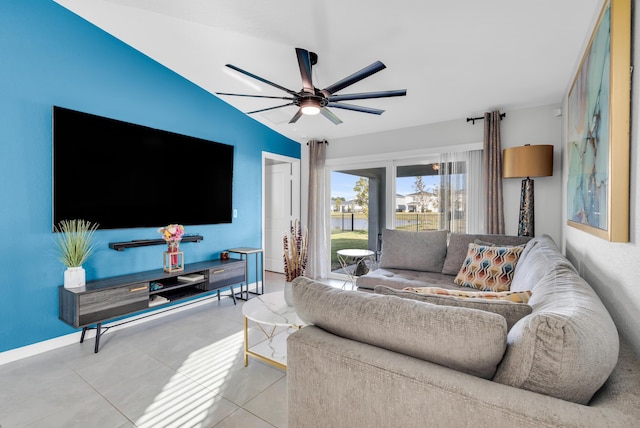 living room featuring light tile patterned floors and ceiling fan