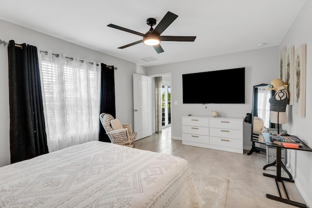 tiled bedroom with ceiling fan