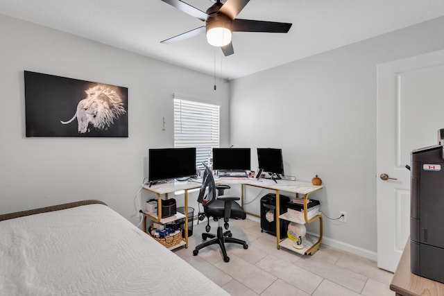 tiled bedroom with ceiling fan