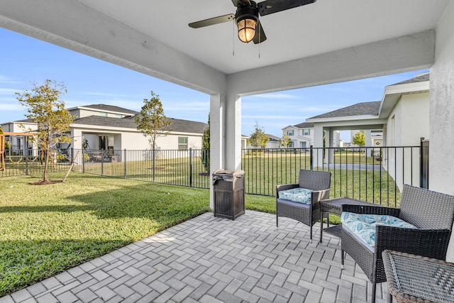 view of patio with ceiling fan