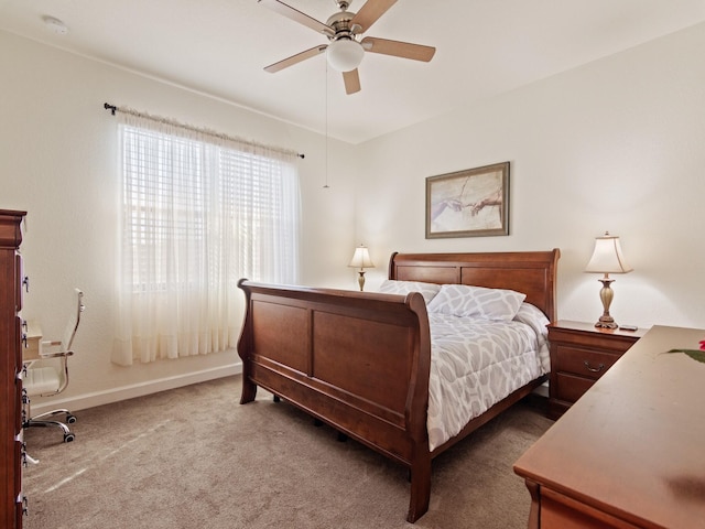 bedroom featuring ceiling fan and carpet floors