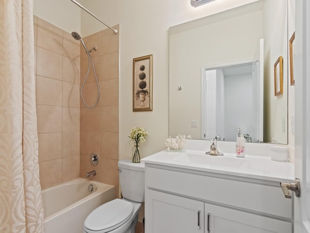 full bathroom with shower / bath combination with curtain, vanity, and toilet